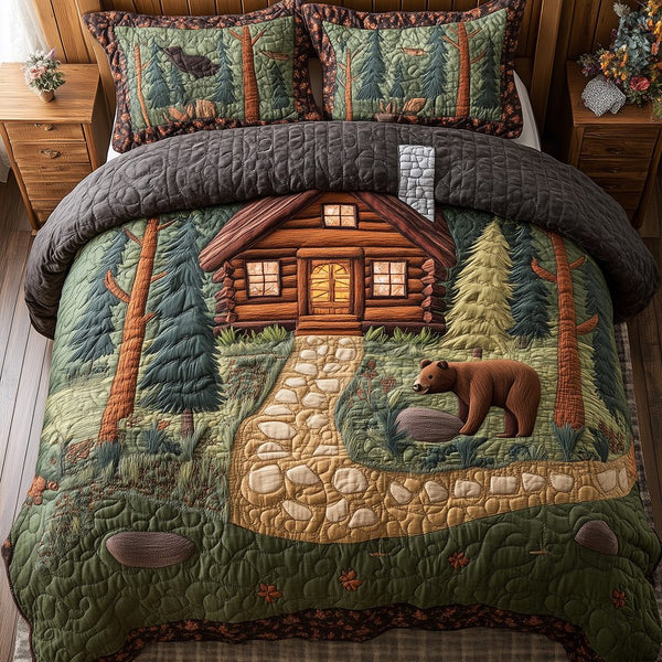 Bear and Cabin quilted 3-piece bedding set on a made bed with two matching pillow shams