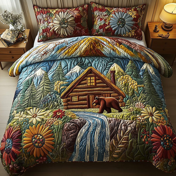 Bear and Cabin quilted 3-piece bedding set on a made bed with two matching pillow shams