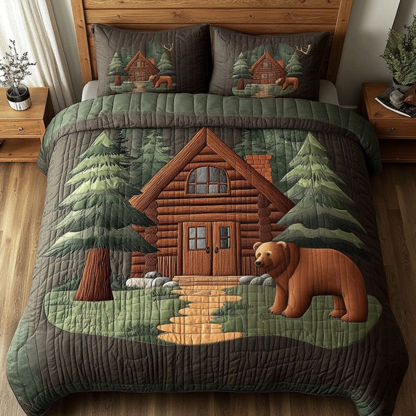 Bear Cabin quilted 3-piece bedding set on a made bed with two matching pillow shams