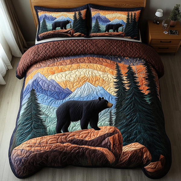 Bear Den quilted 3-piece bedding set on a made bed with two matching pillow shams