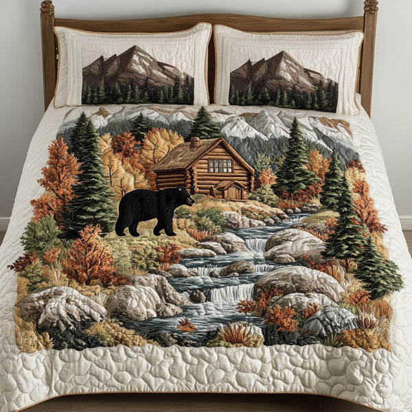 Bear Haven quilted 3-piece bedding set on a made bed with two matching pillow shams