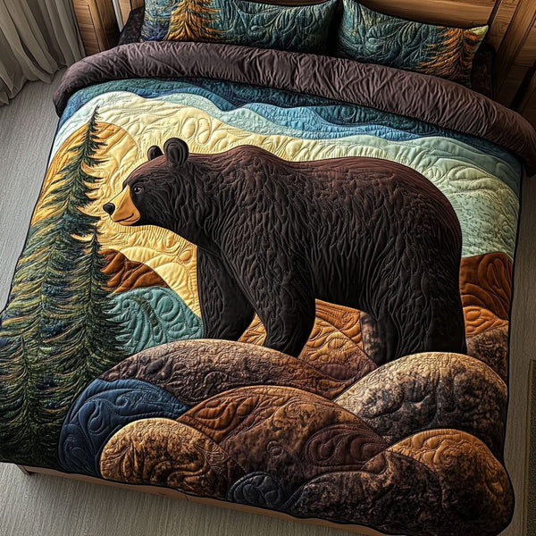 Bear Meadow quilted 3-piece bedding set on a made bed with two matching pillow shams