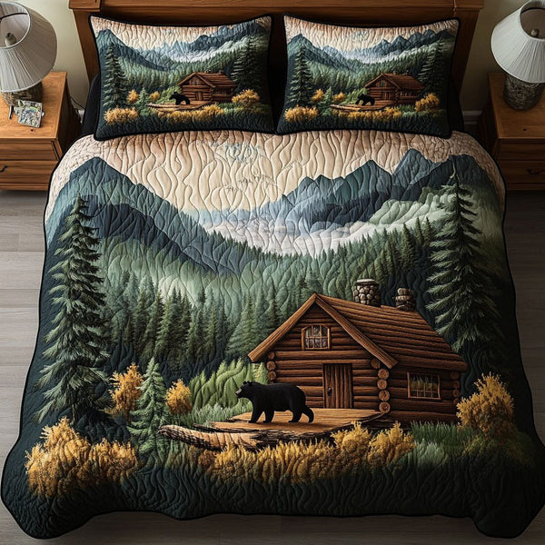 Bear Ridge Lodge quilted 3-piece bedding set on a made bed with two matching pillow shams