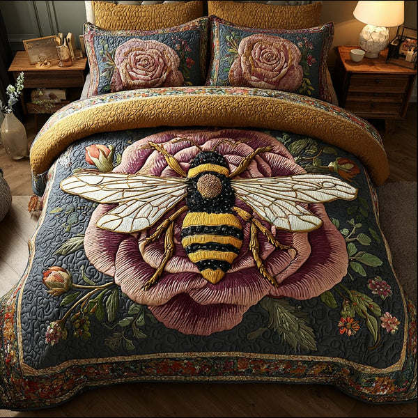 Bee Bliss quilted 3-piece bedding set on a made bed with two matching pillow shams