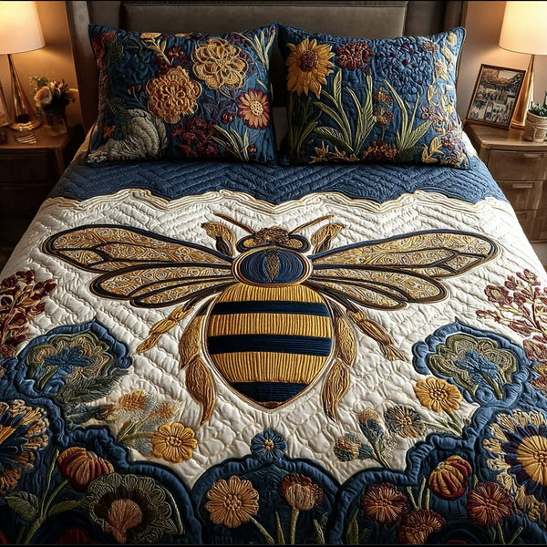 Bee Bloom quilted 3-piece bedding set on a made bed with two matching pillow shams