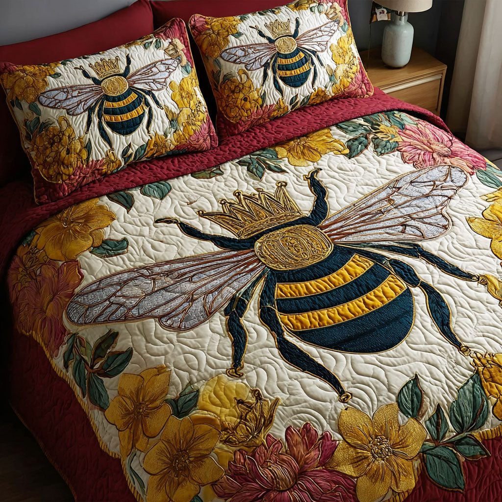 Bee Bloom quilted 3-piece bedding set on a made bed with two matching pillow shams