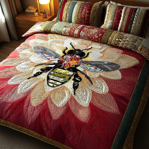 Bee Charm quilted 3-piece bedding set on a made bed with two matching pillow shams