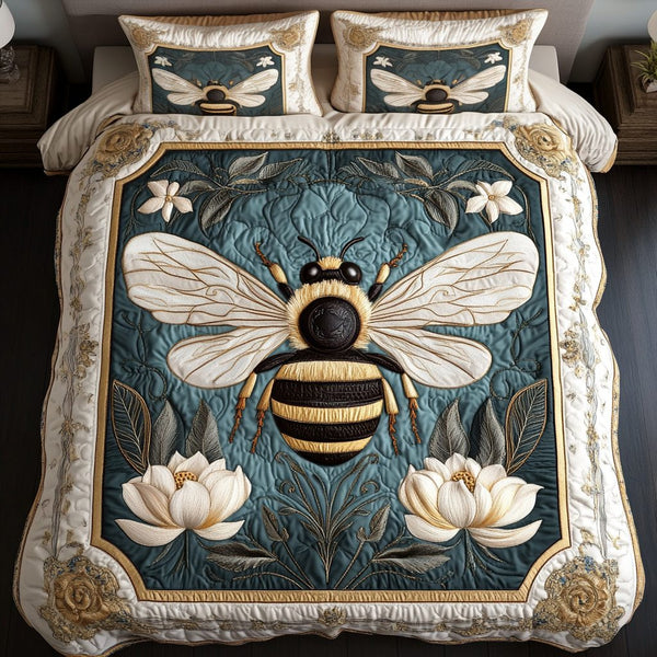 Bee Charm quilted 3-piece bedding set on a made bed with two matching pillow shams