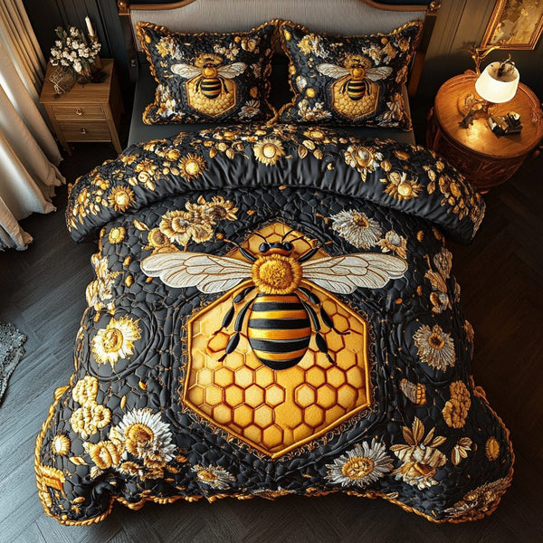 Bee Dance quilted 3-piece bedding set on a made bed with two matching pillow shams