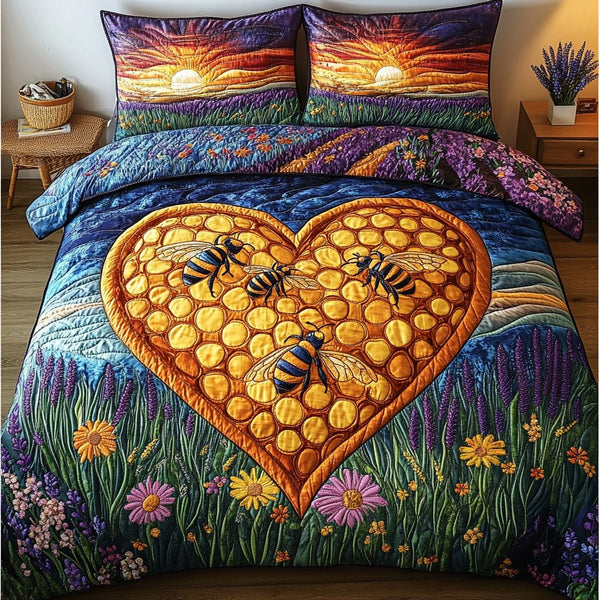Bee Dance quilted 3-piece bedding set on a made bed with two matching pillow shams