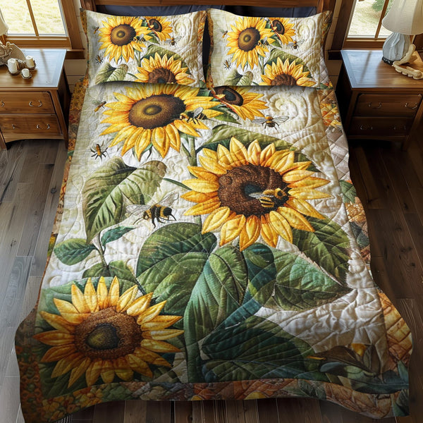 Bee-Flower Serenade quilted 3-piece bedding set on a made bed with two matching pillow shams