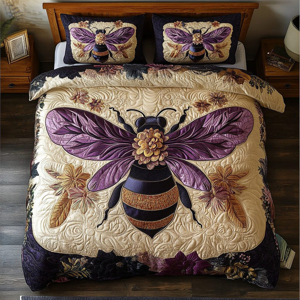 Bee Garden quilted 3-piece bedding set on a made bed with two matching pillow shams