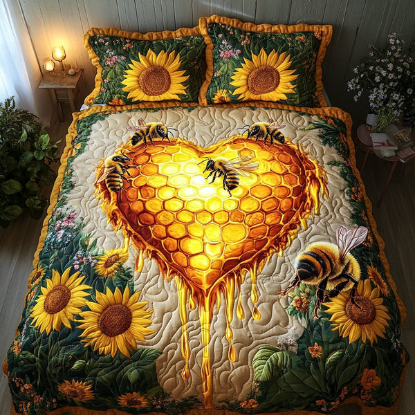 Bee Garden quilted 3-piece bedding set on a made bed with two matching pillow shams
