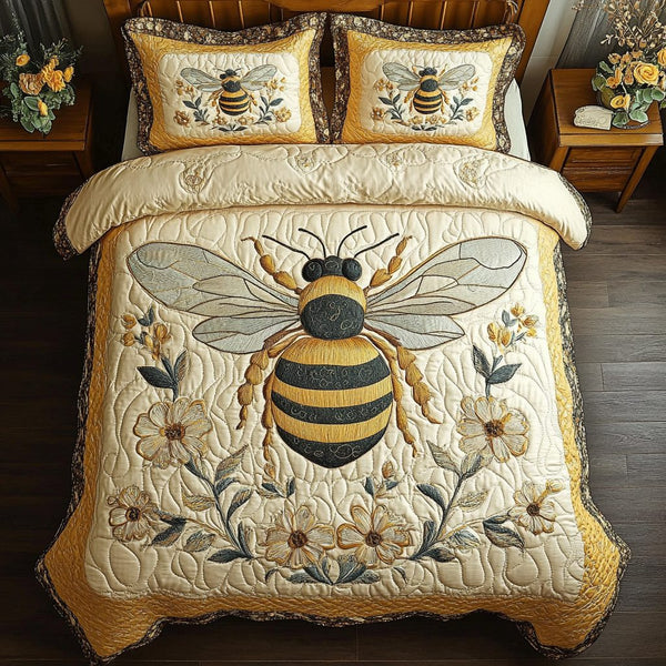 Bee Garden quilted 3-piece bedding set on a made bed with two matching pillow shams