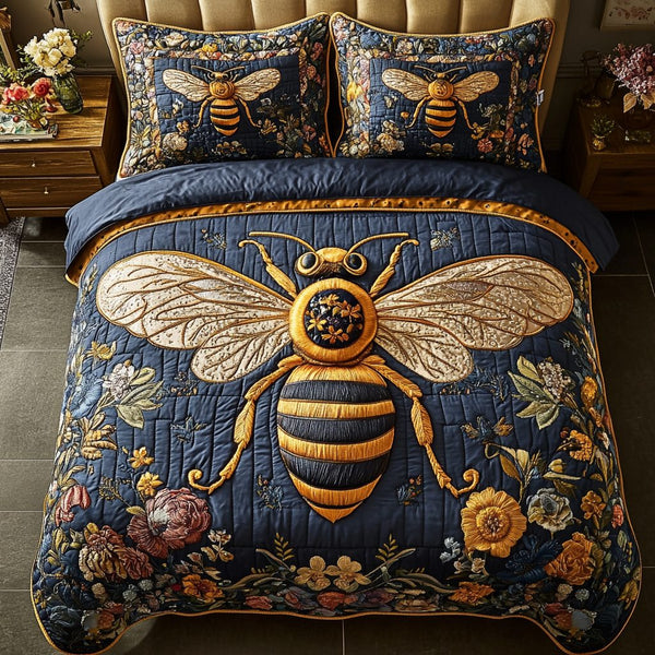 Bee Glow quilted 3-piece bedding set on a made bed with two matching pillow shams