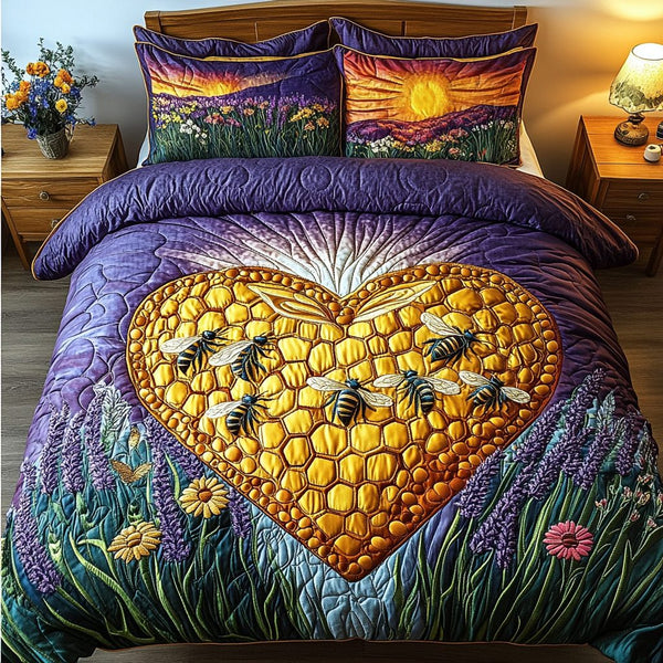 Bee Glow quilted 3-piece bedding set on a made bed with two matching pillow shams