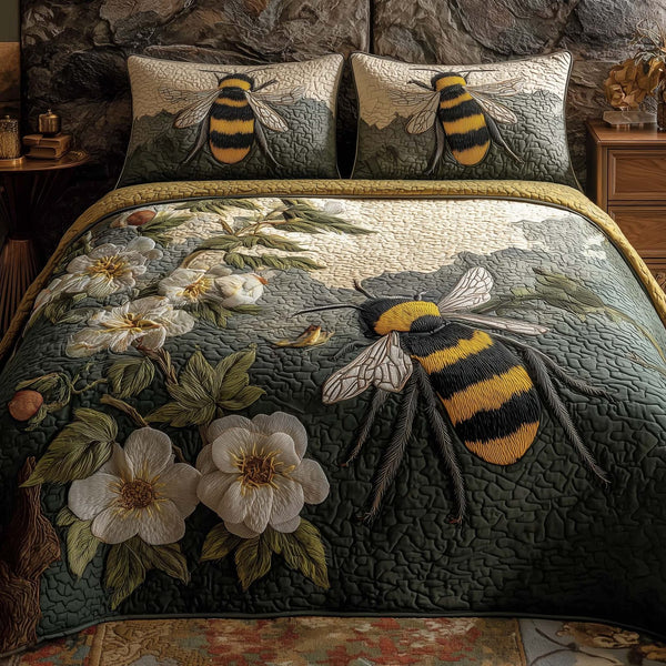 Bee Heaven quilted 3-piece bedding set on a made bed in a softly lit bedroom