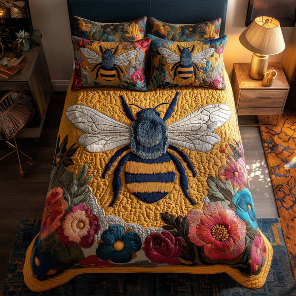 Bee Heaven quilted 3-piece bedding set on a made bed in a softly lit bedroom