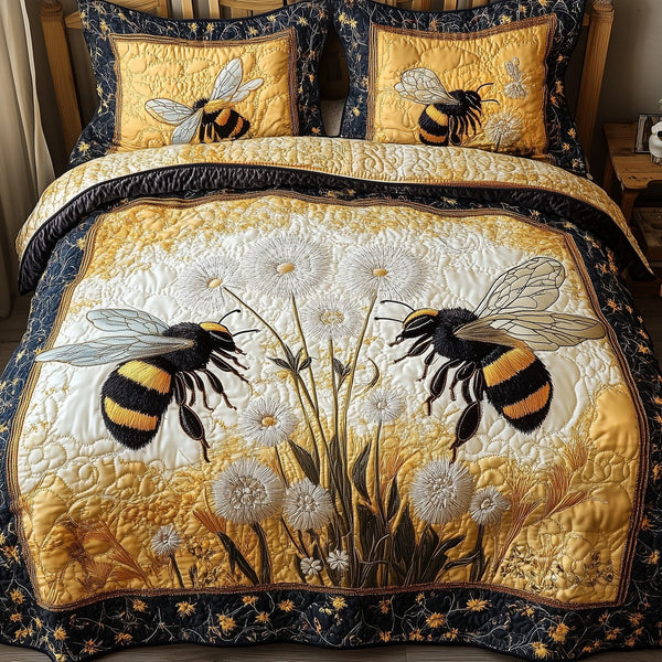 Bee Kind quilted 3-piece bedding set on a made bed with two matching pillow shams