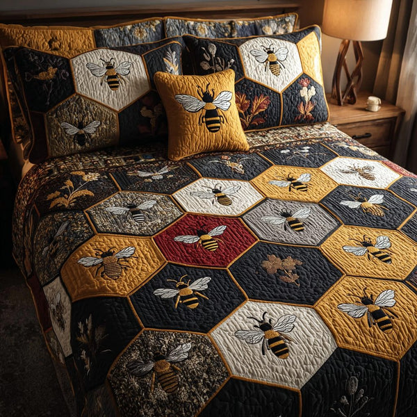 Bee Spirit quilted 3-piece bedding set on a made bed with two matching pillow shams