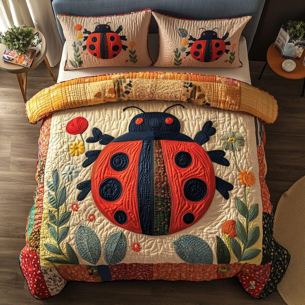Beetle Bliss quilted 3-piece bedding set on a made bed with two matching pillow shams