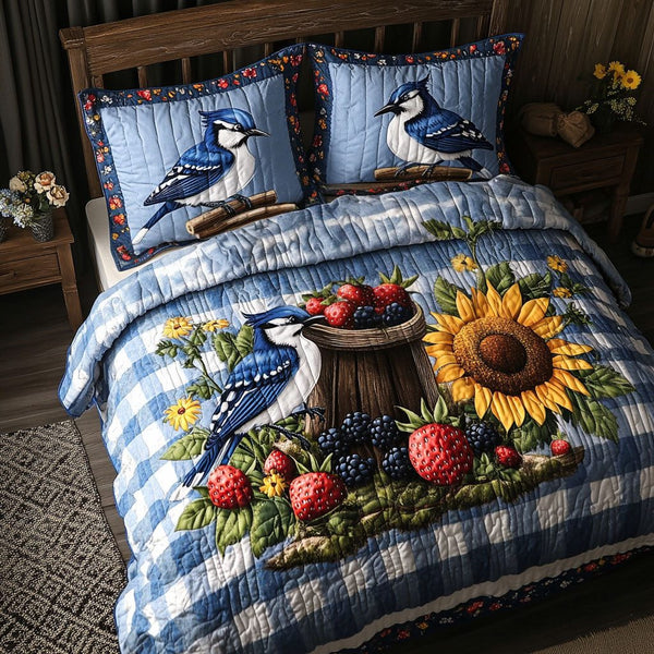 Bench and Bird quilted 3-piece bedding set on a made bed with two matching pillow shams