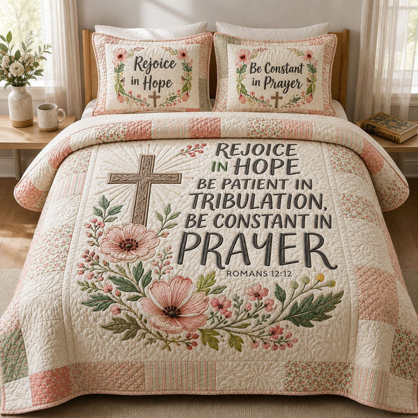 Bible Verse Floral quilted 3-piece bedding set on a made bed in a softly lit bedroom