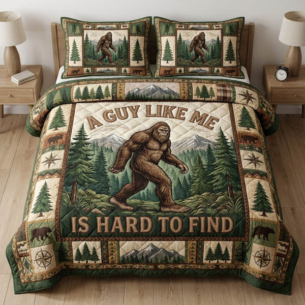 Bigfoot Camp quilted 3-piece bedding set on a made bed with two matching pillow shams