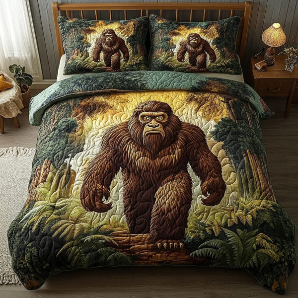 Bigfoot Dreams quilted 3-piece bedding set on a made bed with two matching pillow shams