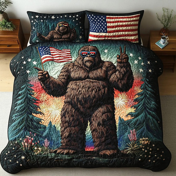 BigFoot Freedom quilted 3-piece bedding set on a made bed in a warmly lit bedroom
