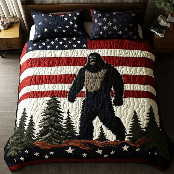 BigFoot Peace quilted 3-piece bedding set on a made bed with two matching pillow shams