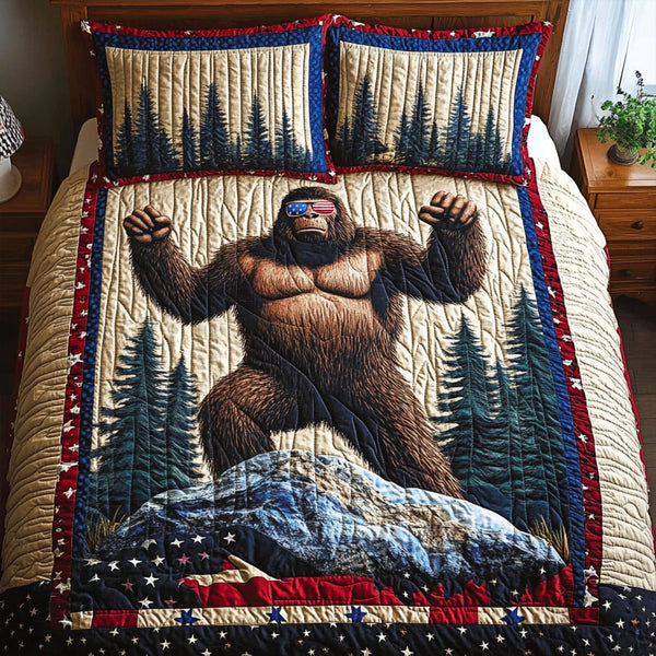 Bigfoot Pride quilted 3-piece bedding set on a made bed with two matching pillow shams