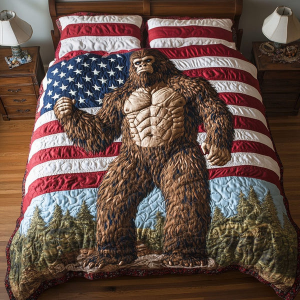 Bigfoot Pride quilted 3-piece bedding set on a made bed with two matching pillow shams