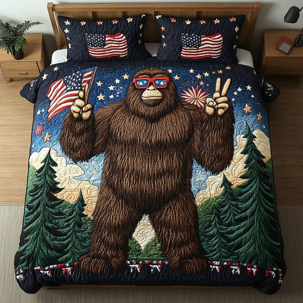 BigFoot Proud quilted 3-piece bedding set on a made bed with two matching pillow shams