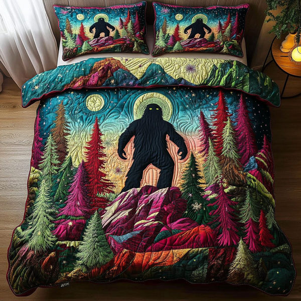 Bigfoot quilted 3-piece bedding set on a made bed with two matching pillow shams