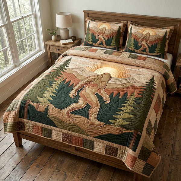 Bigfoot Roam quilted 3-piece bedding set on a made bed with two matching pillow shams