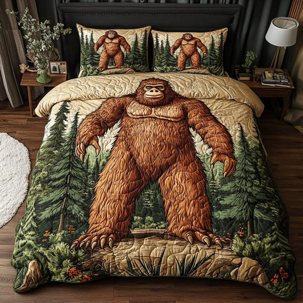 Bigfoot Tracks quilted 3-piece bedding set on a made bed with two matching pillow shams