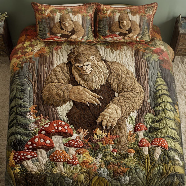 Bigfoot Trail quilted 3-piece bedding set on a made bed with two matching pillow shams