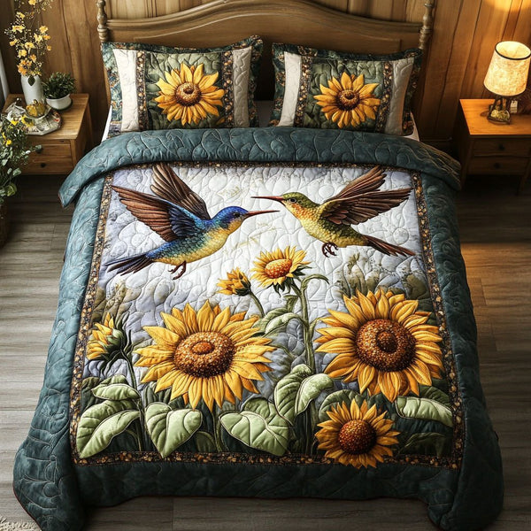 Bird and Blossoms quilted 3-piece bedding set on a made bed with two matching pillow shams
