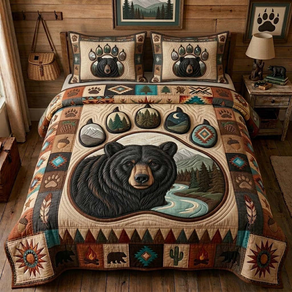 Black Bear Portrait quilted 3-piece bedding set on a made bed with two matching pillow shams