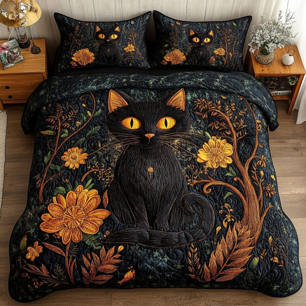 Black Blossom quilted 3-piece bedding set on a made bed with two matching pillow shams
