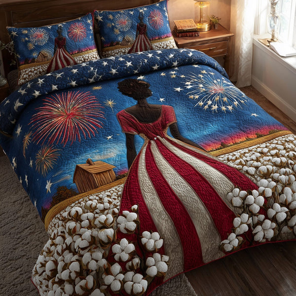 Black History quilted 3-piece bedding set on a made bed with two matching pillow shams