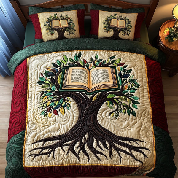 Black History Tree quilted 3-piece bedding set on a made bed with two matching pillow shams