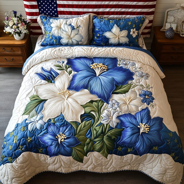 Bloom Bed quilted 3-piece bedding set on a made bed with two matching pillow shams