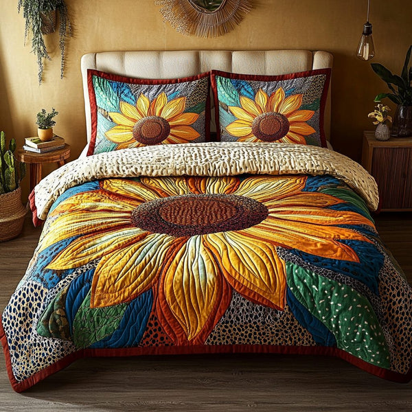 Bloom Bright quilted 3-piece bedding set on a made bed with two matching pillow shams