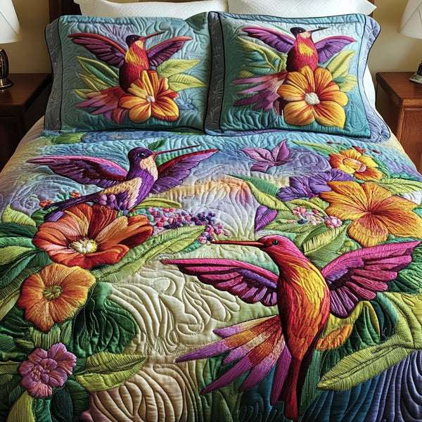 Bloom Dance quilted 3-piece bedding set on a made bed with two matching pillow shams