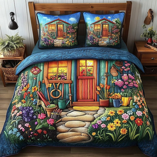 Bloom Escape quilted 3-piece bedding set on a made bed with two matching pillow shams