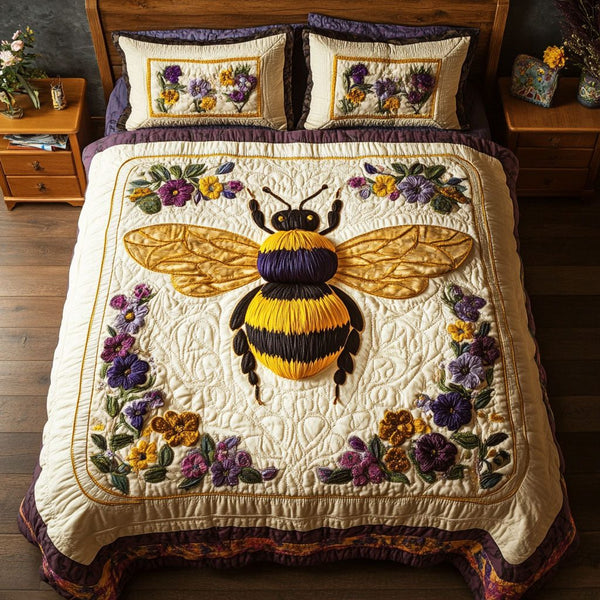 Bloom Guardian quilted 3-piece bedding set on a made bed with two matching pillow shams