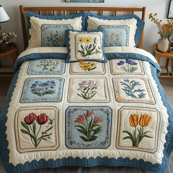 Bloom Haven quilted 3-piece bedding set on a made bed with two matching pillow shams