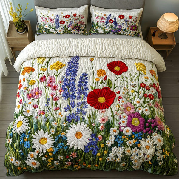 Bloom Haven quilted 3-piece bedding set on a made bed with two matching pillow shams